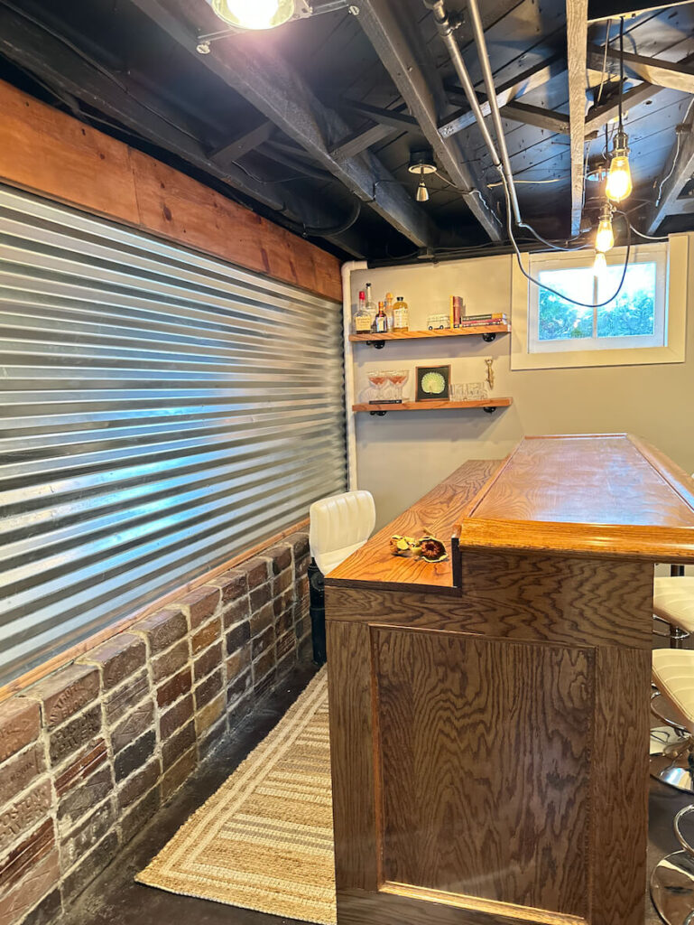 Expose wood ceiling in 100 year old house painted black.