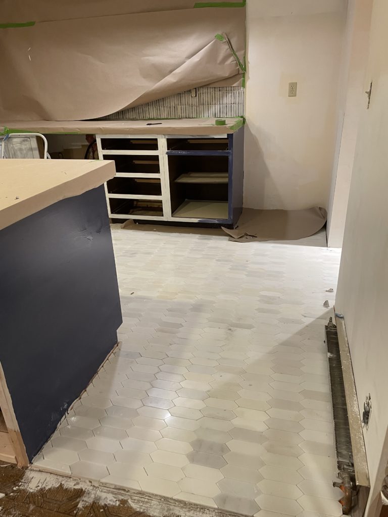 Kitchen Renovation featuring marble flooring from Jeffery Court Tile
