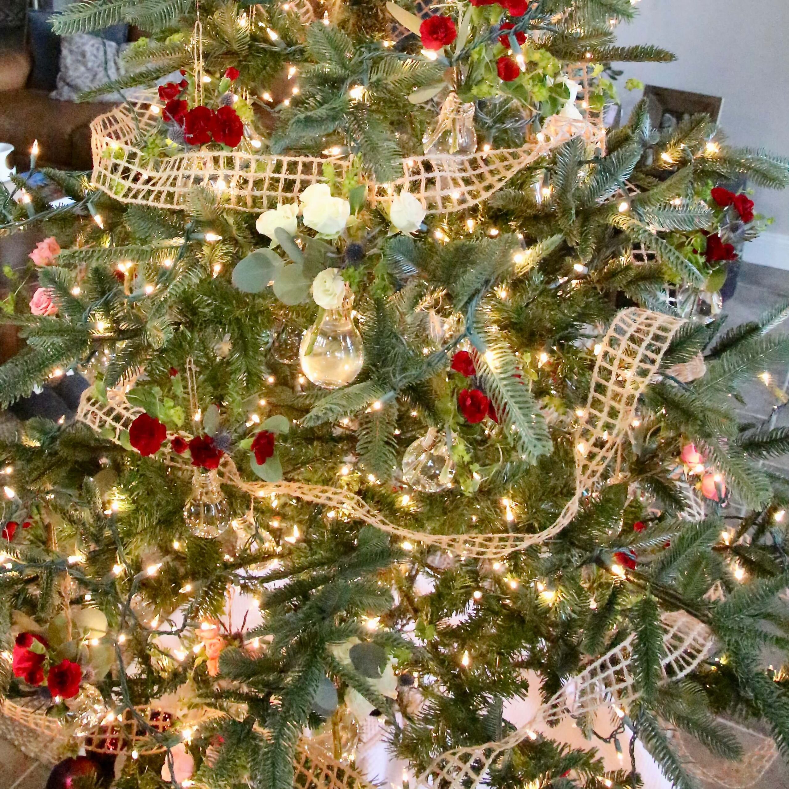 Christmas Tree Decorated with Freshly Cut Flowers.