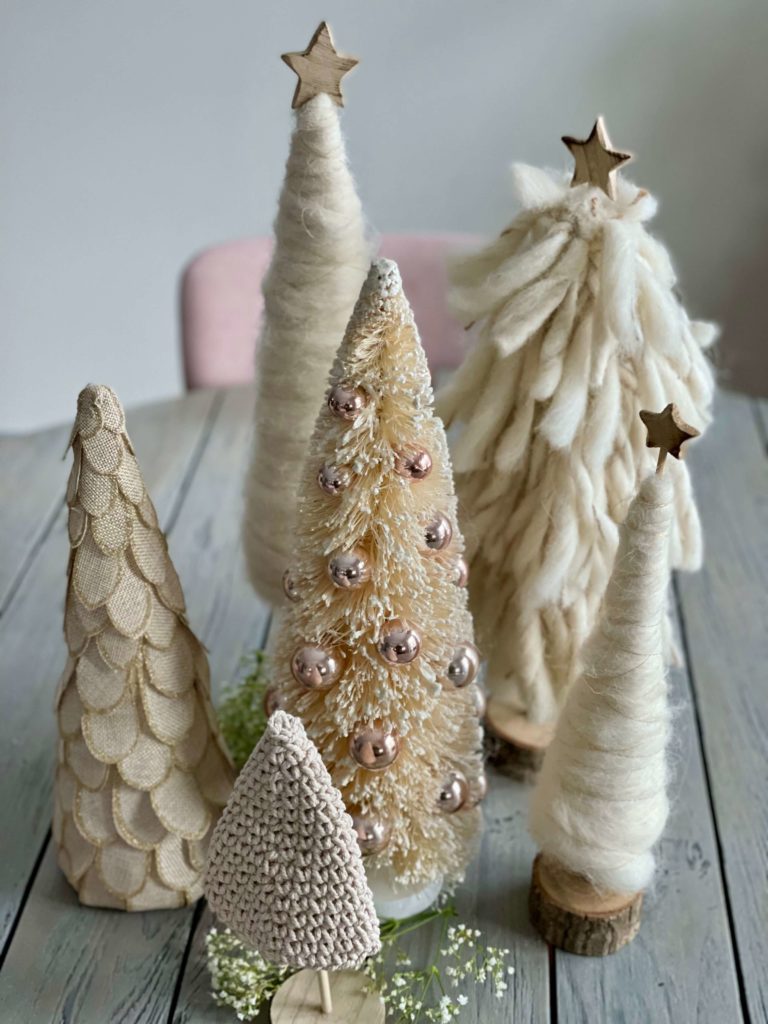 Several textured cream and white Christmas trees
