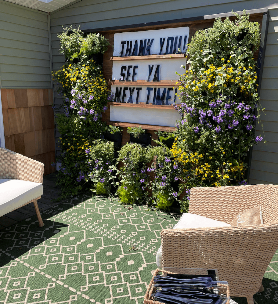 Outdoor Living Plant Wall with a letter board.