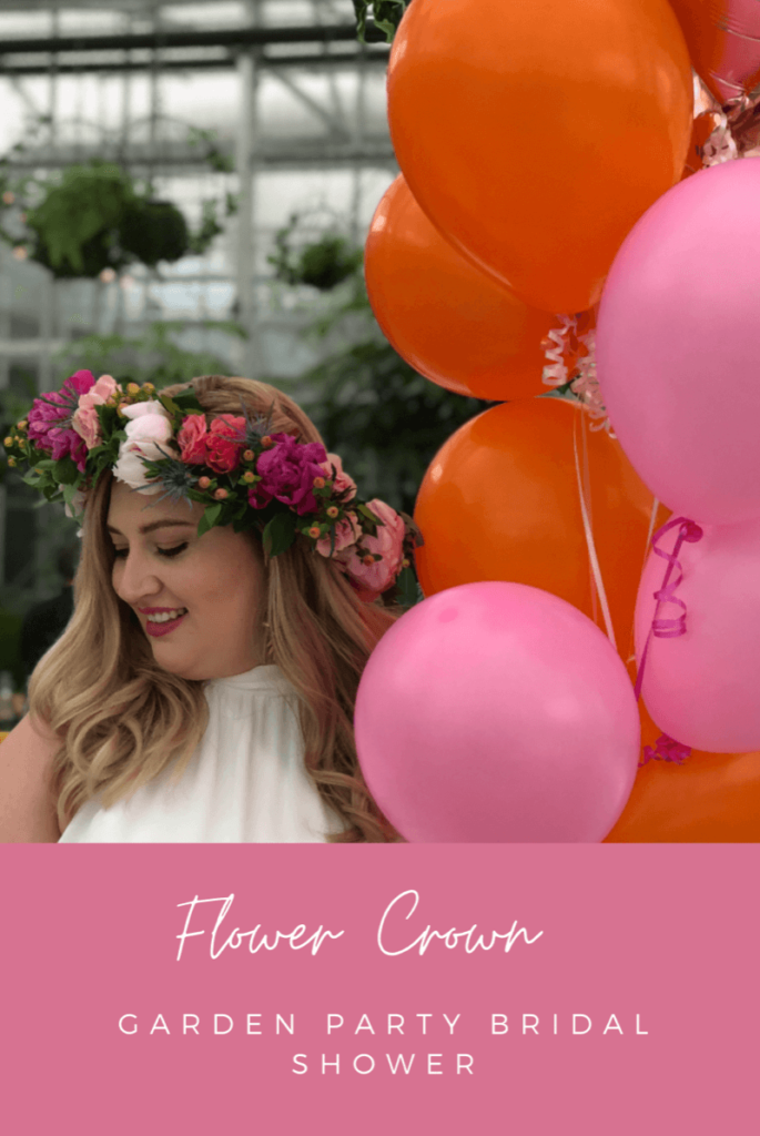 Pin Image with bride wearing a floral crown.