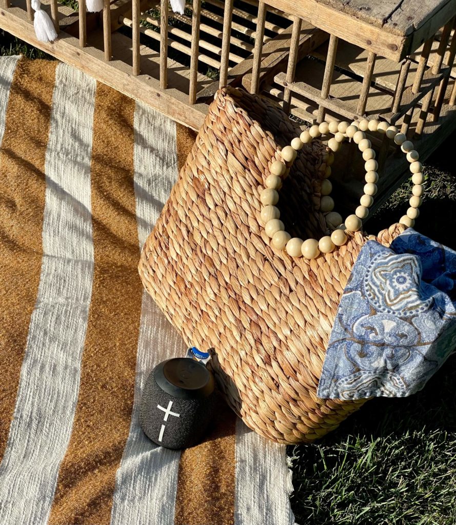 Bluetooth speaker and woven bag.