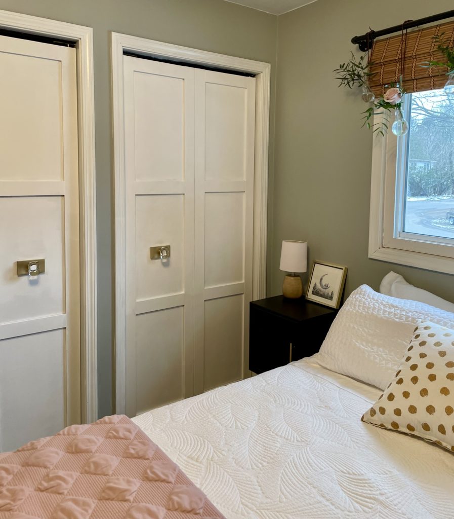 Upgraded closet doors with moulding in bedroom refresh