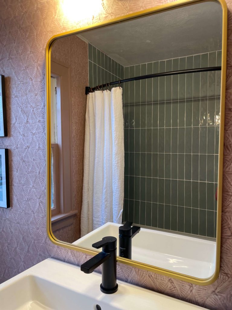 Bathroom Remodel Reveal with Green Tile and pretty wallpaper.