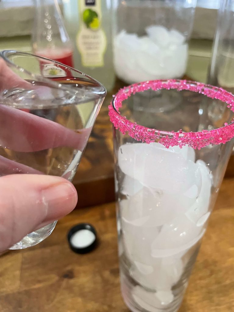 Pouring Vodka in a High Ball Glass.