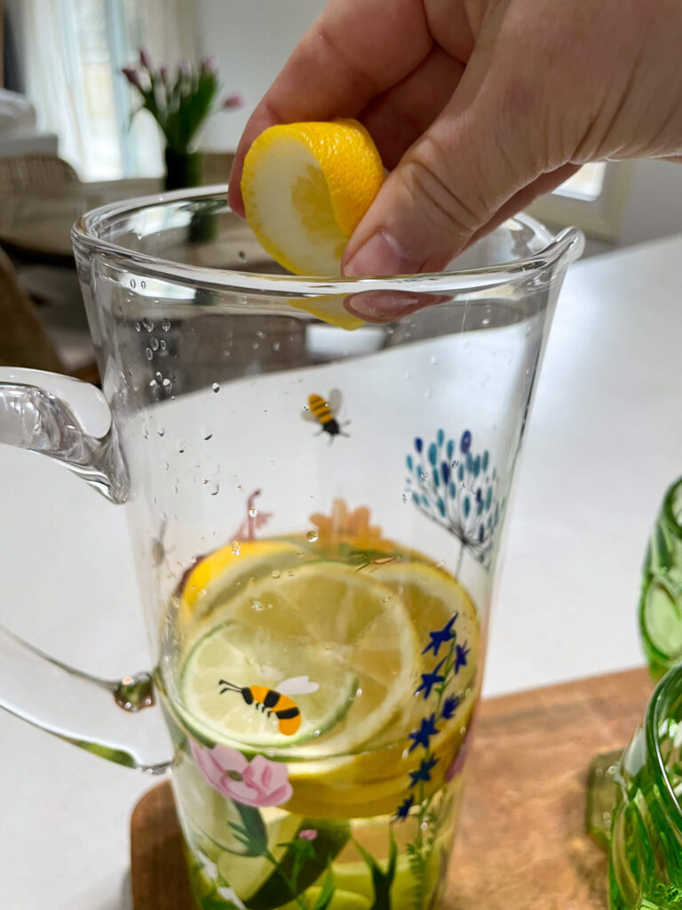 Mixing ingredients for a refreshing lemon-lime sangria.
