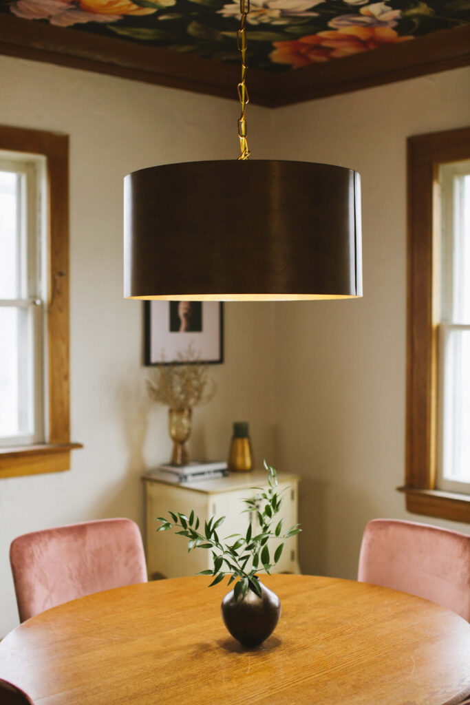 Copper light fixture in a dining room