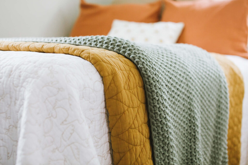 Cozy bedding in warm tones