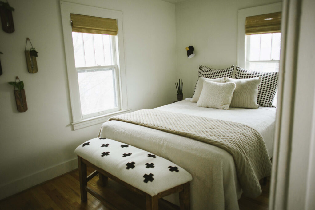 Neutral Bedding featuring creams and blacks and white for a Moody Modern Home