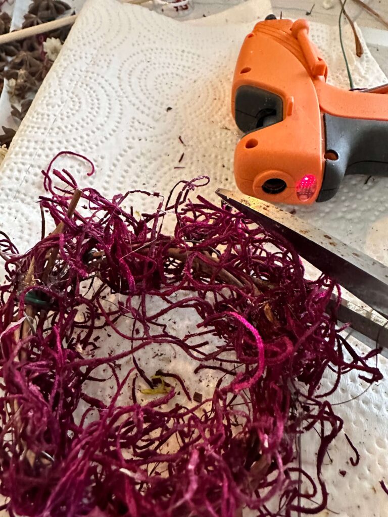 Purple moss for a DIY Christmas Ornament.