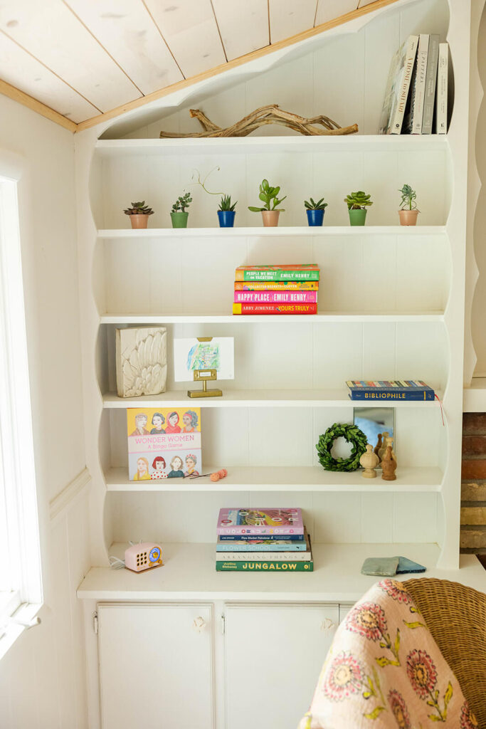 Cottage bookshelves styled in a minimalist vibe.