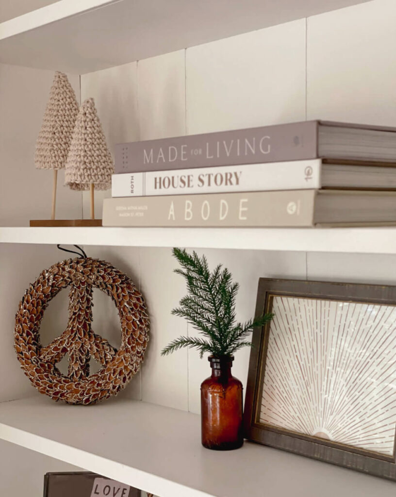 Shelves styled for the Holidays with natural touches.
