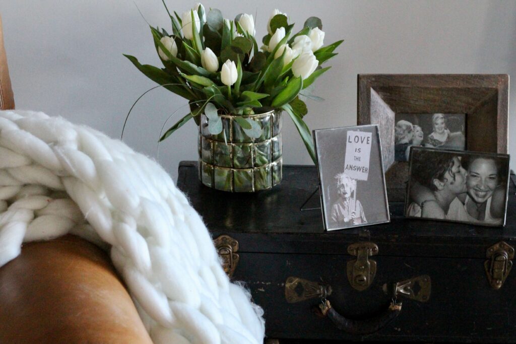 Flowers, family photos and a cozy throw to add warmth to your winter home.