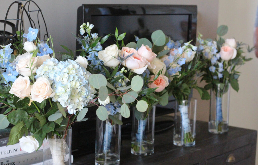 DIY Bridal bouquets in vases ready for the bridal party.