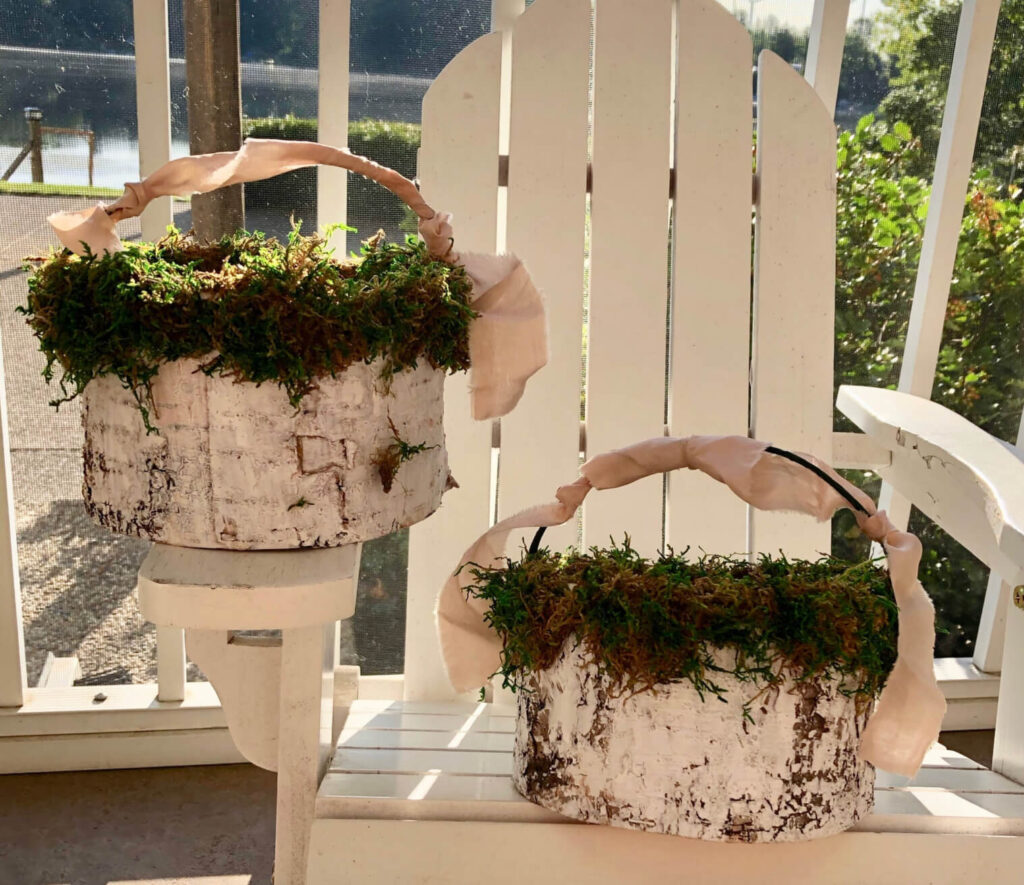Flower Girl Baskets with moss and ribbon.