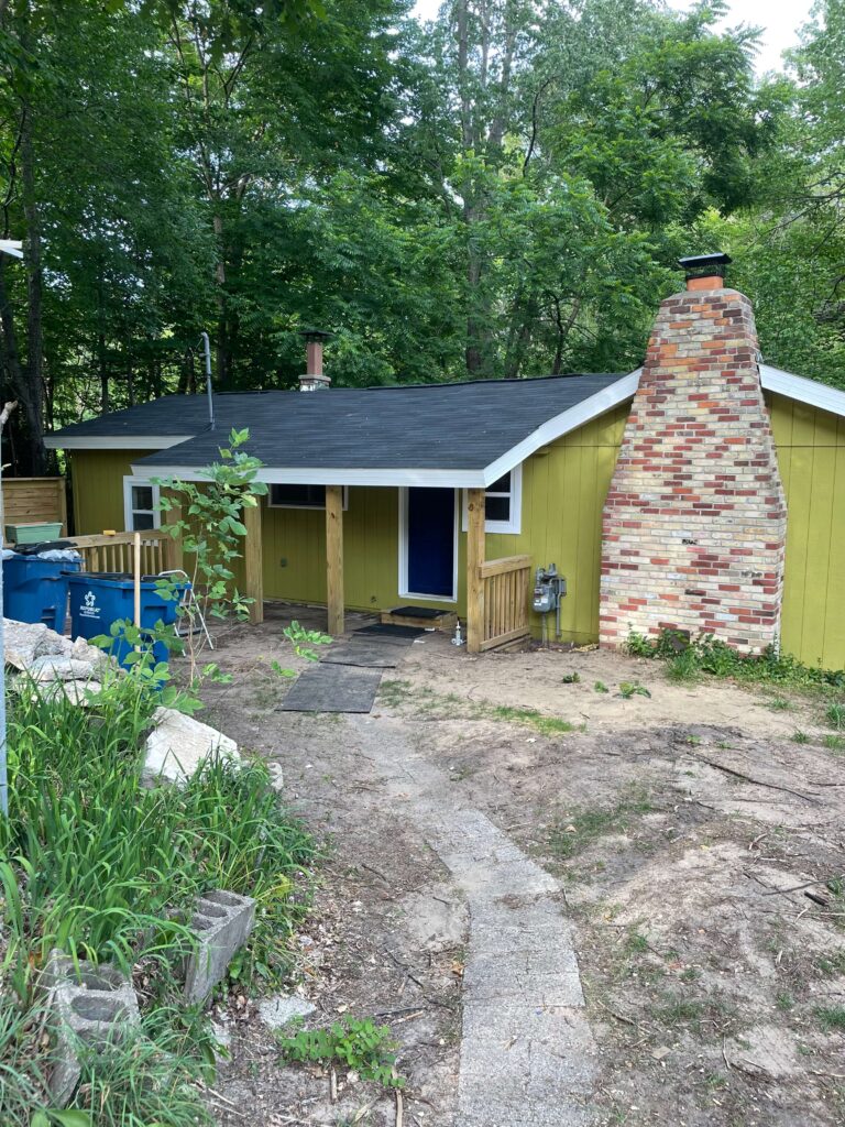 Before pic of cottage landscaping project.