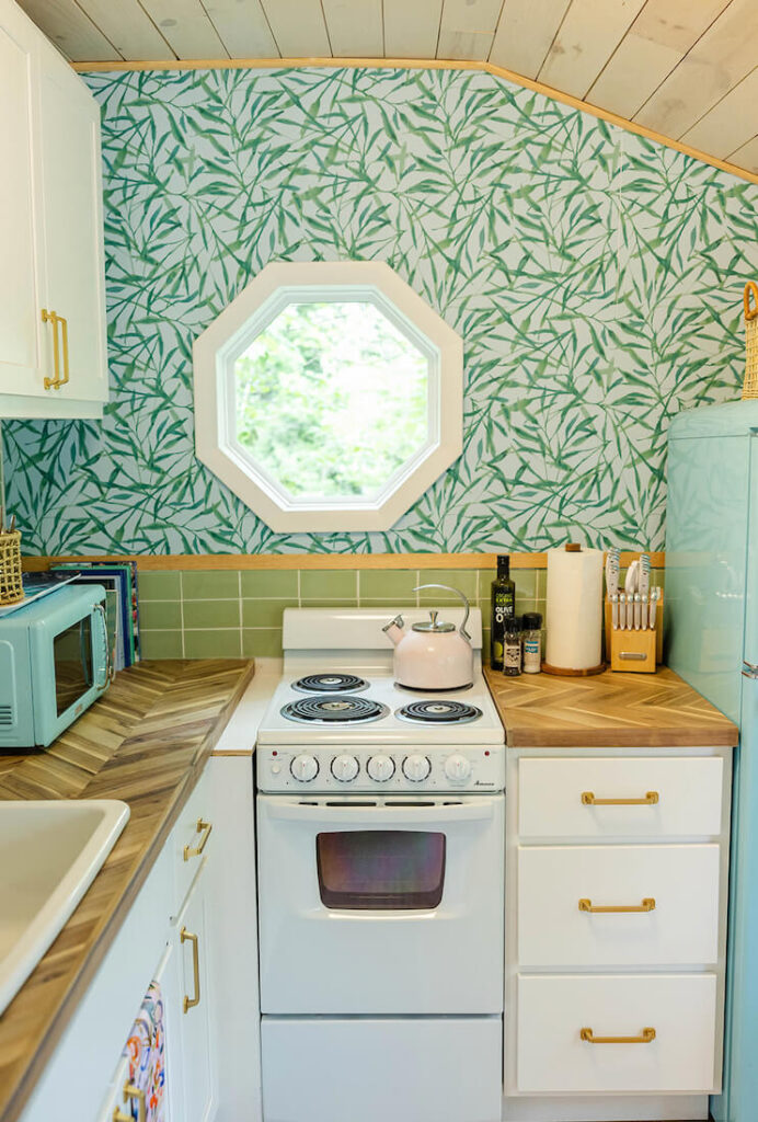 Peel-and-stick wallpaper in a small cozy cottage kitchen.