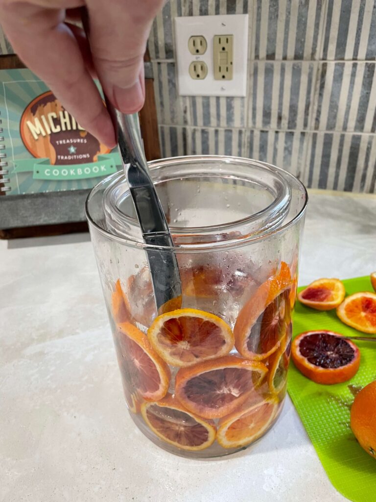Sliced blood oranges in DIY arrangement.