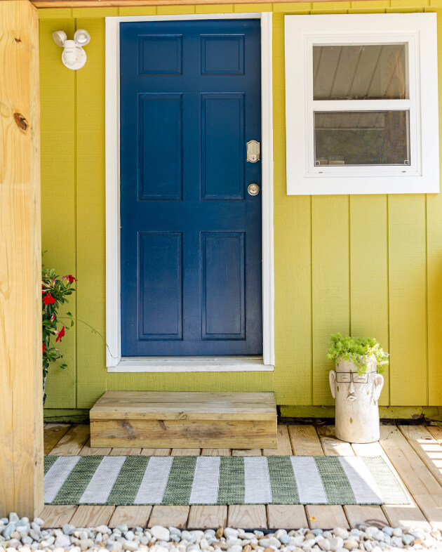 Blue door (SW Indigo) on a Green Cottage