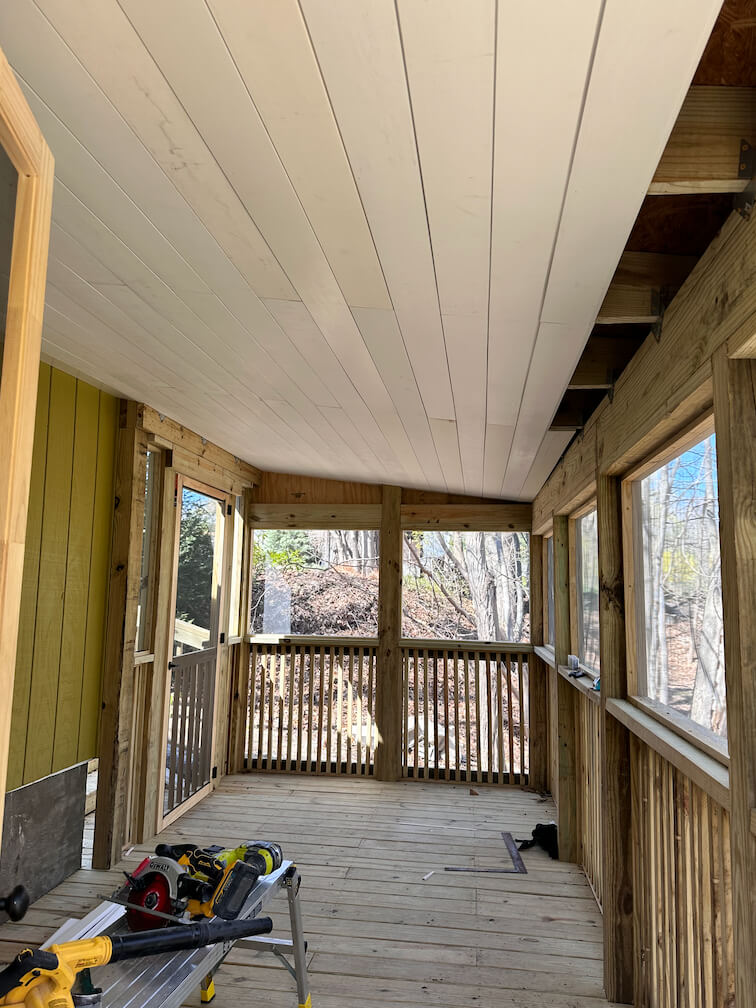 In process shot of a screened in porch at a summer cottage in Pentwater, MI