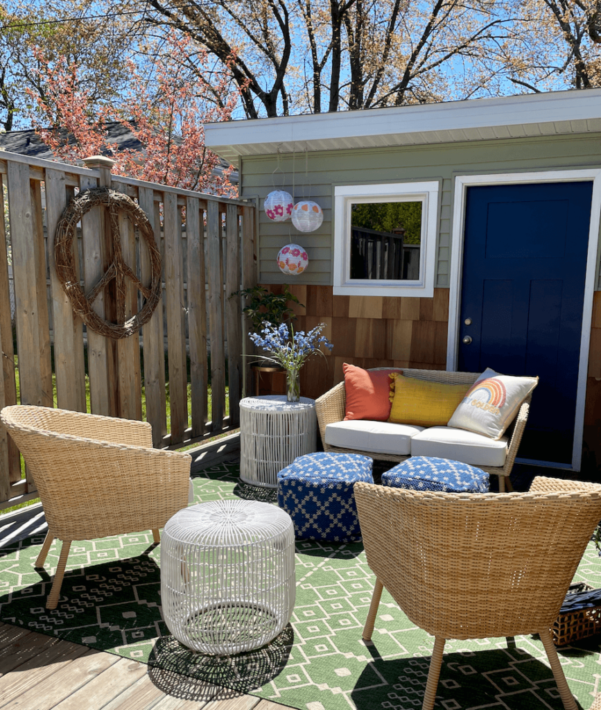 Deck area styled with colorful textiles.