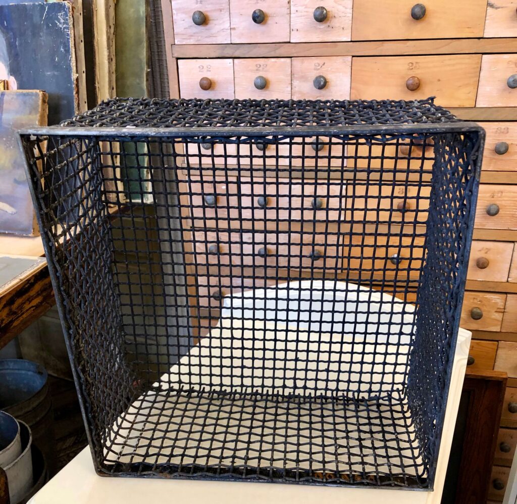 Vintage Black metal basket for storage.