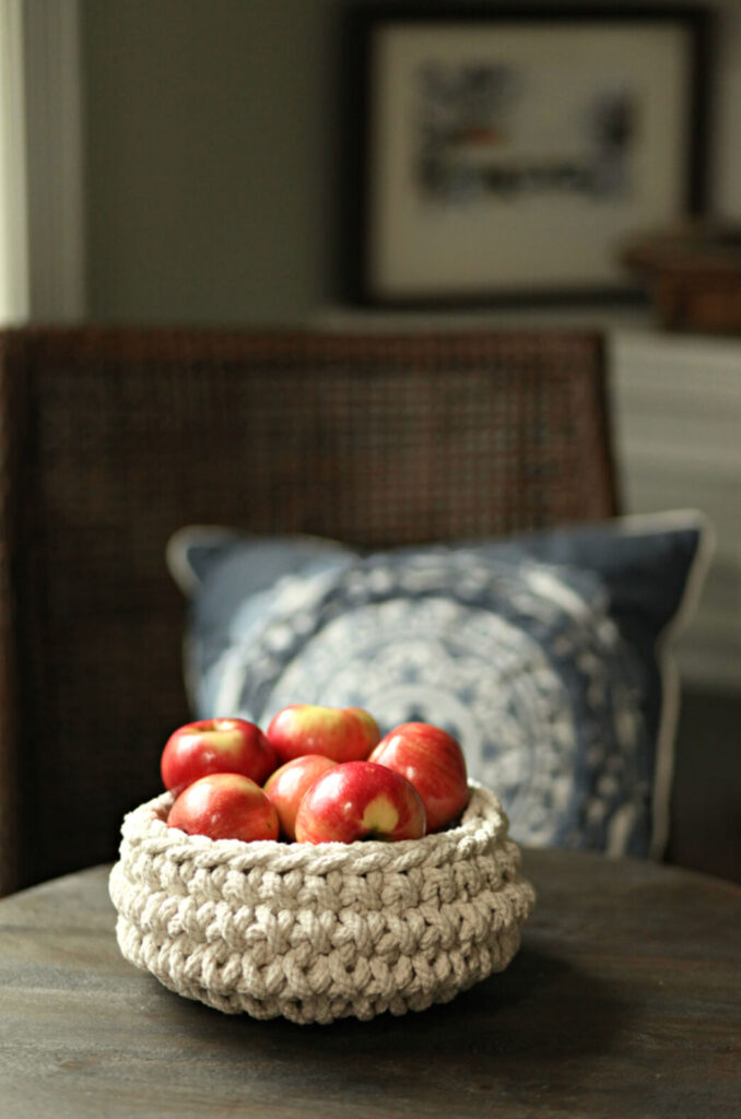 Woven basket filled with apples for Fall Decor