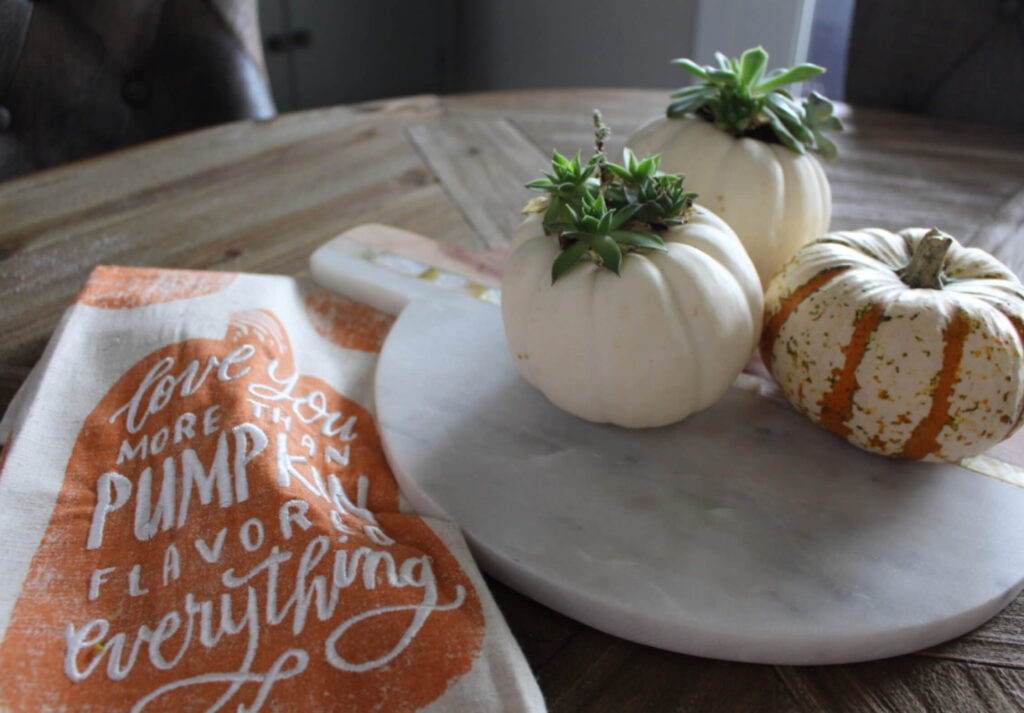 Mini pumpkins and a Fall tea towel for Fall.