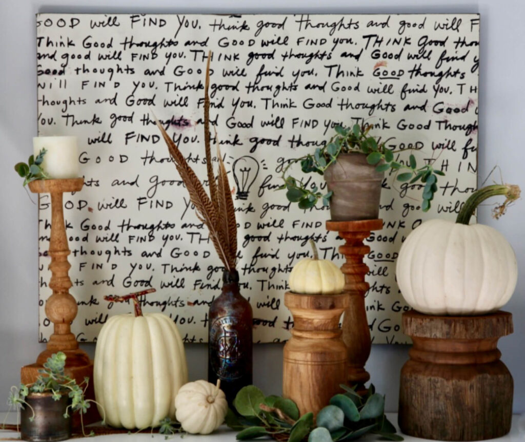 Adding plants, feathers, succulents and warm woods is a simple way to decorate your home for gall. #woodsandwhite #fall #simplefall #naturalfall