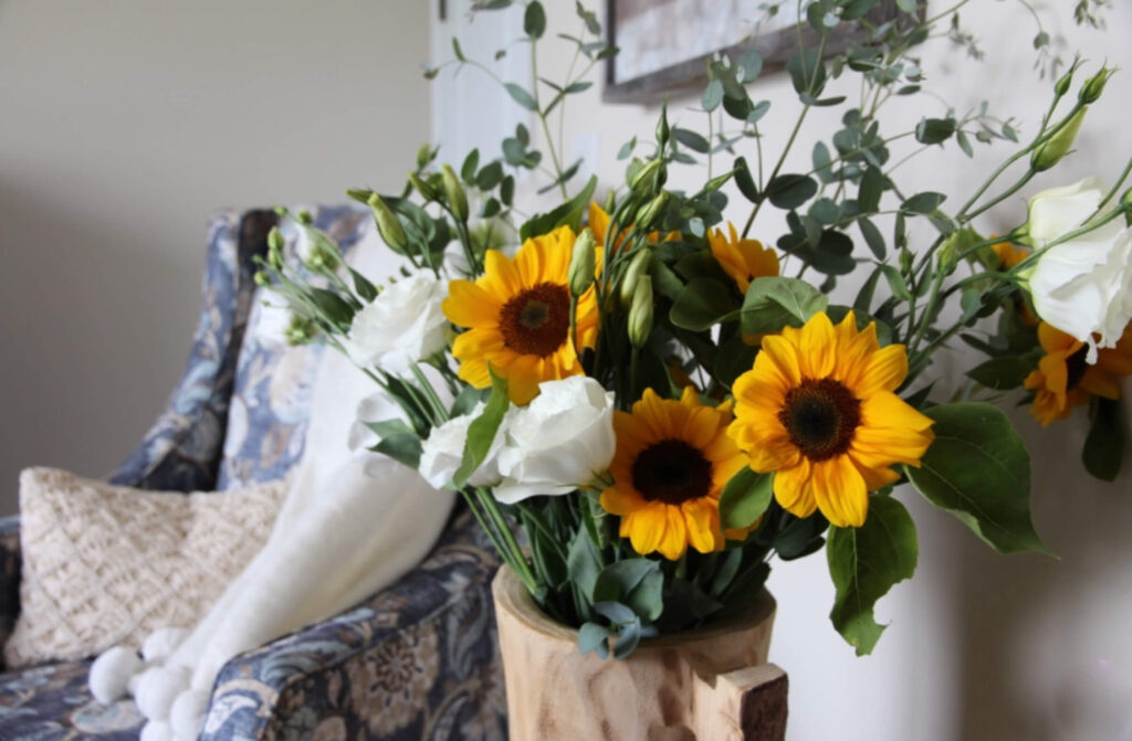 Wooden Vase filled with sunflowers