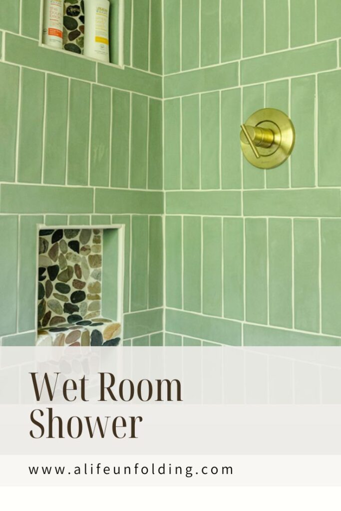 Green Tile and River Rock for a cottage wet room.