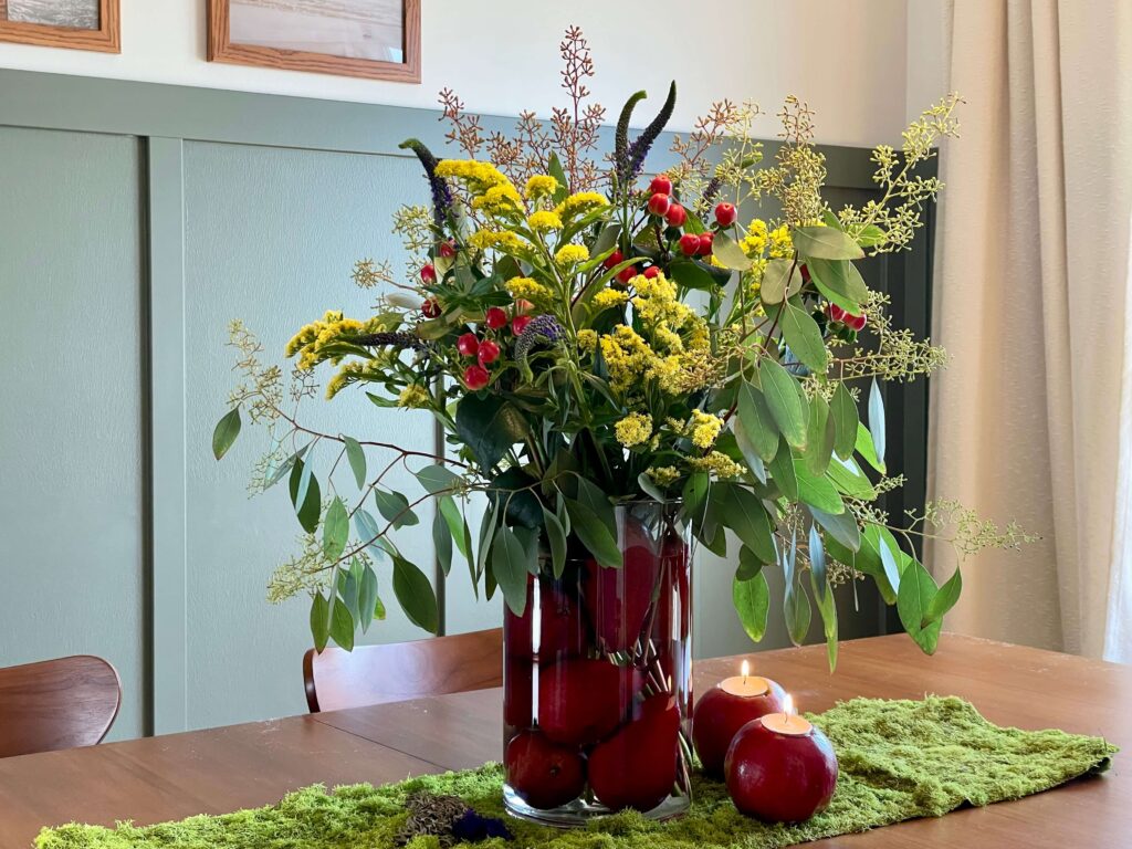 Fall Centerpiece with Fall Flowers, Apples and Pears.