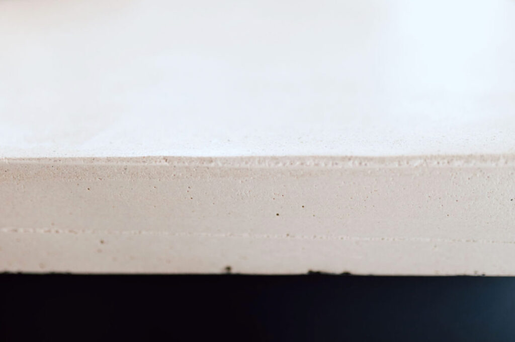 Close up of a white concrete countertop