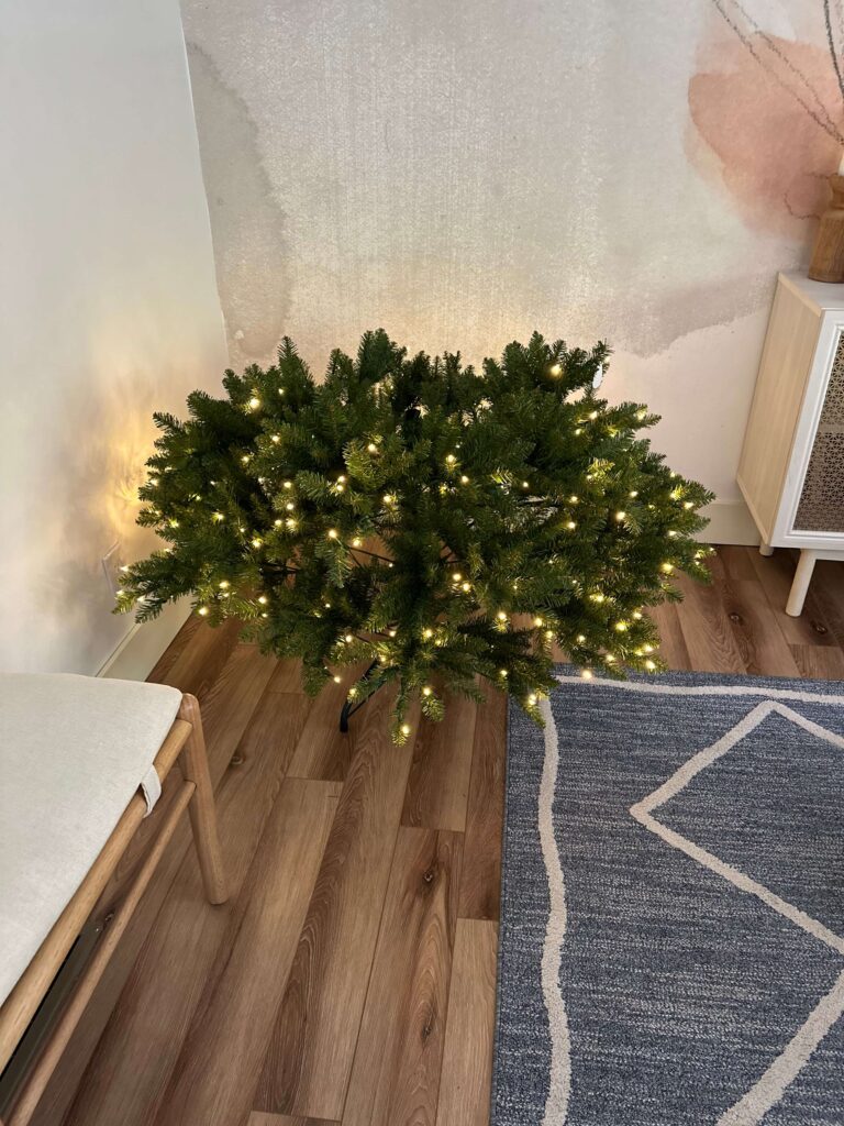 Create a magical Christmas with this pre-lit artificial tree. Warm lights, lush foliage, and easy setup - it's the perfect holiday tree!