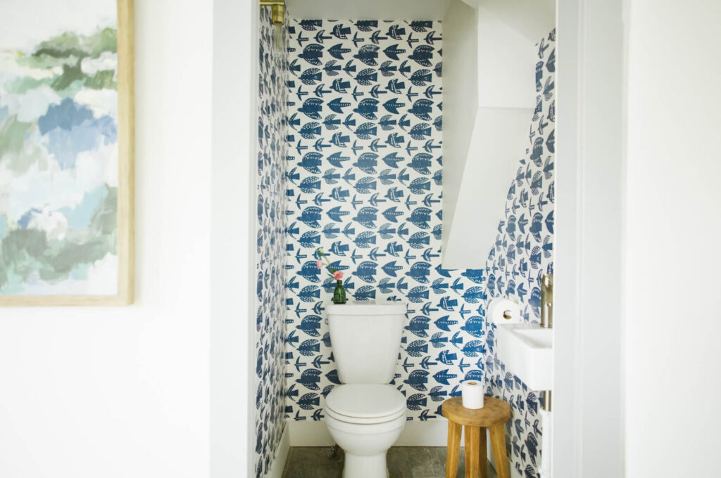 Powder Room featuring a bold wallpaper statement. Blue and White.