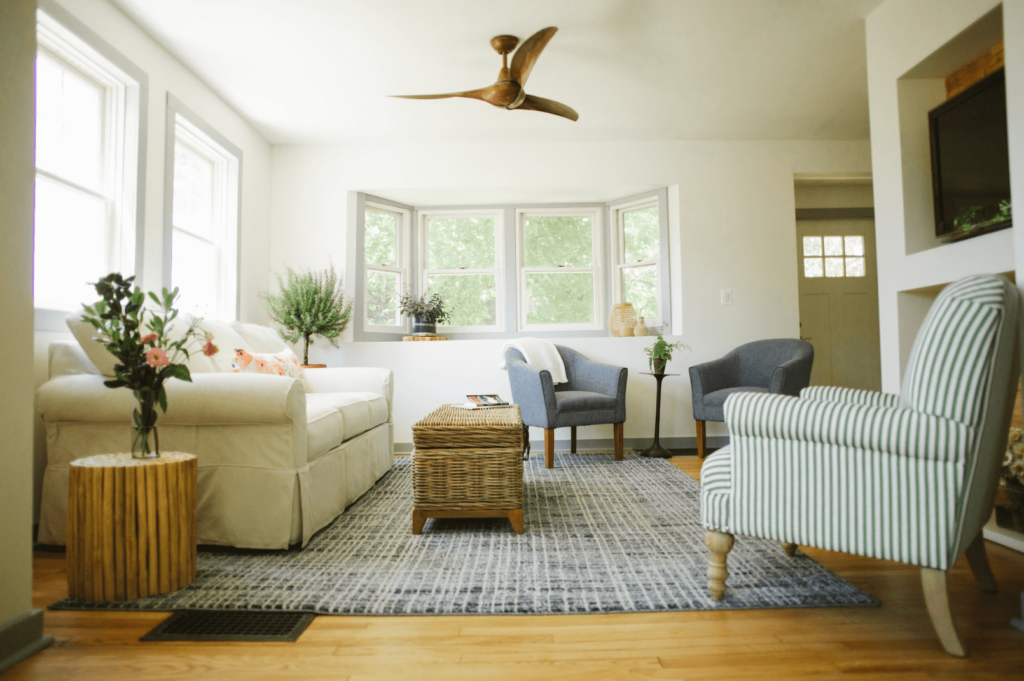 Living room at a short-term rental property decked out in greens and blues.