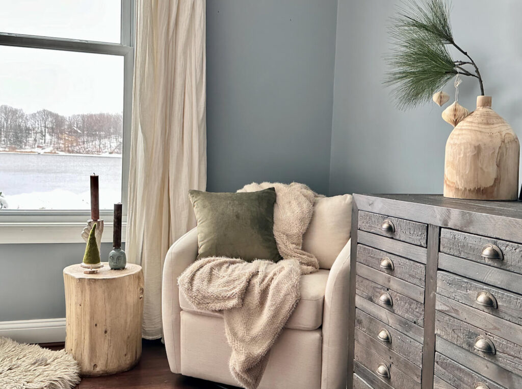 Blue bedroom with festive decor for the holidays.