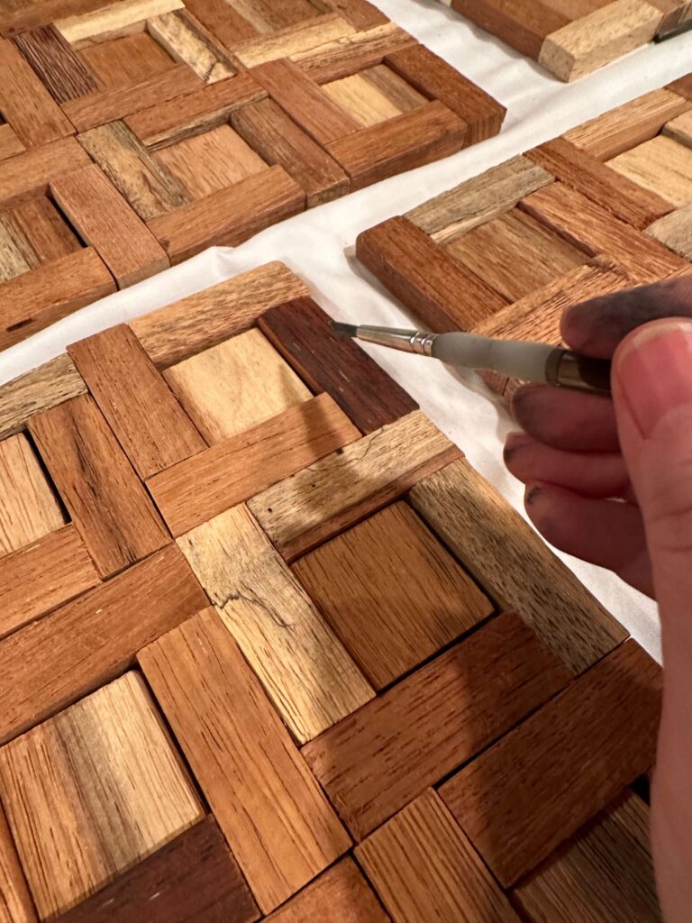 Reclaimed Wood Tiles for a DIY Headboard.