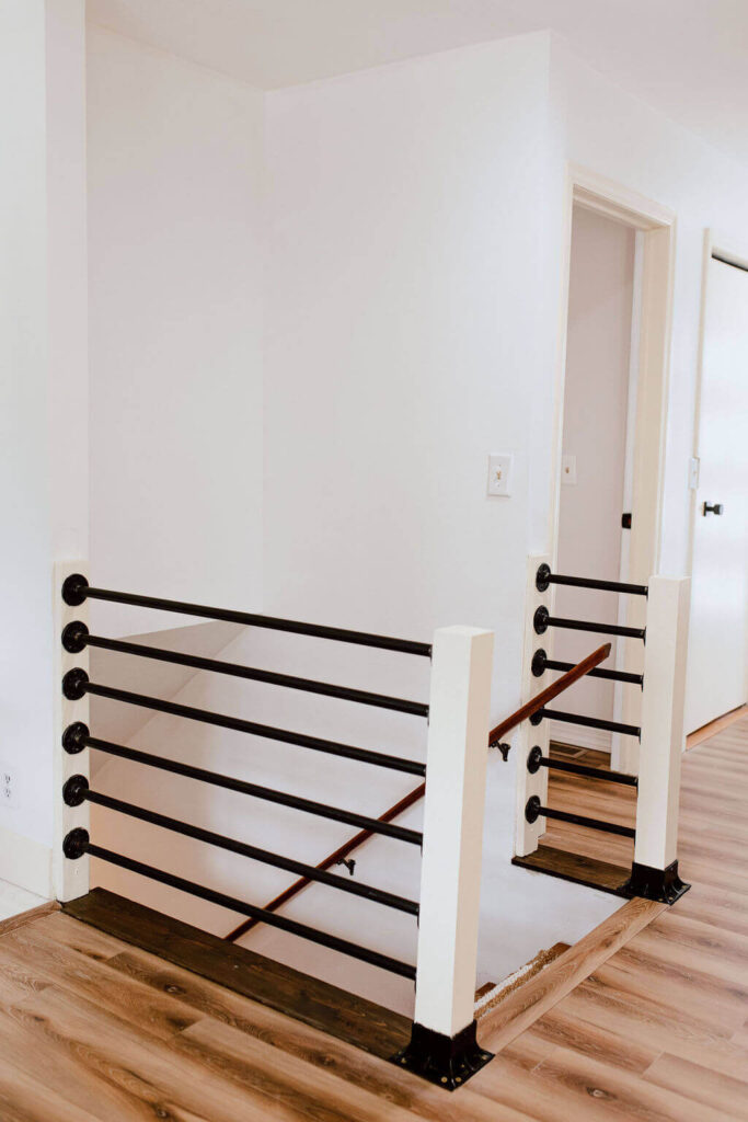 Stair railing updated from drab and dirty to modern