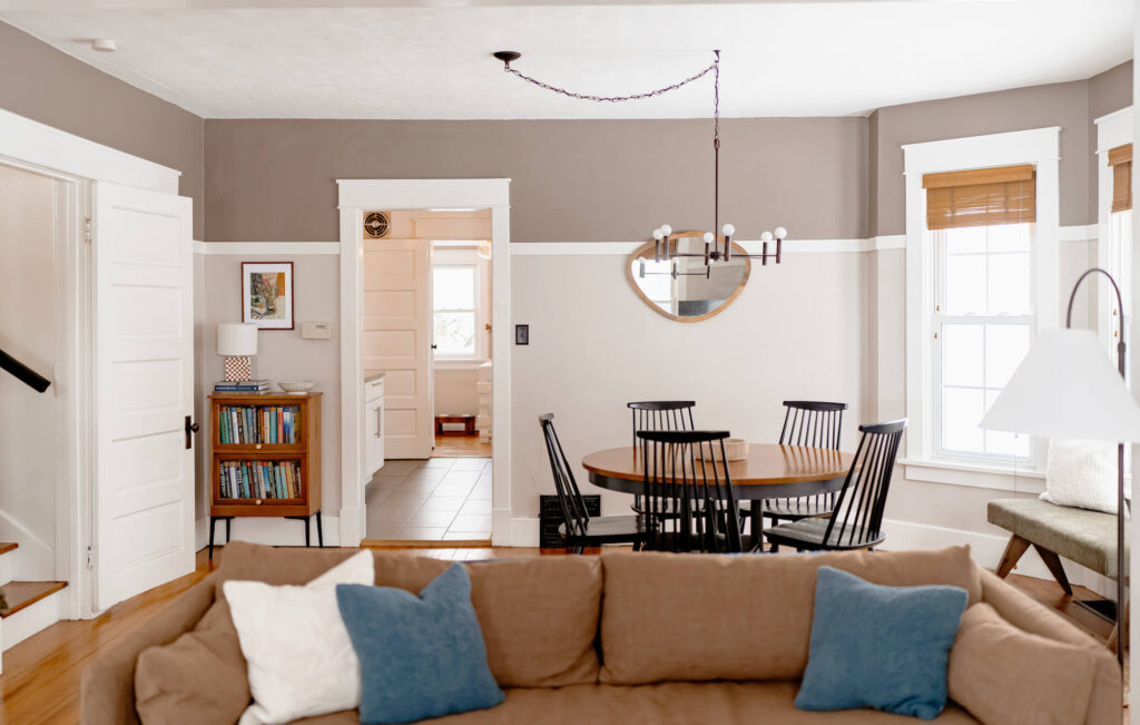 Living Room with Brown Sofa from Crate and Barrel and Blue pillows