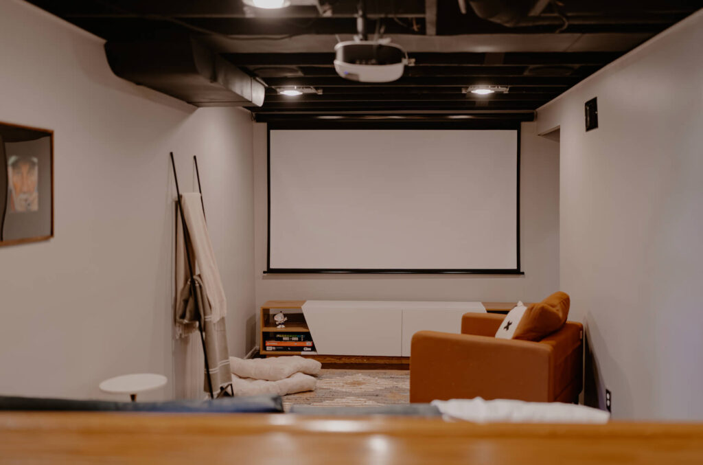 Movie Screen in a Theatre Room in a basement.