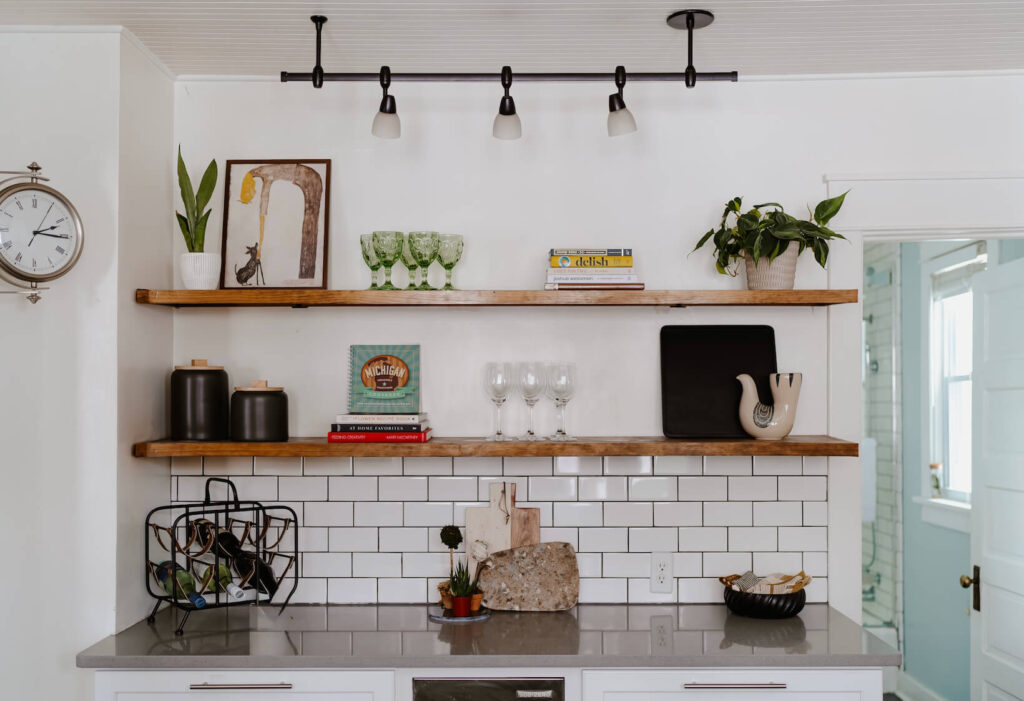 Open wood Shelving in a White kitchen