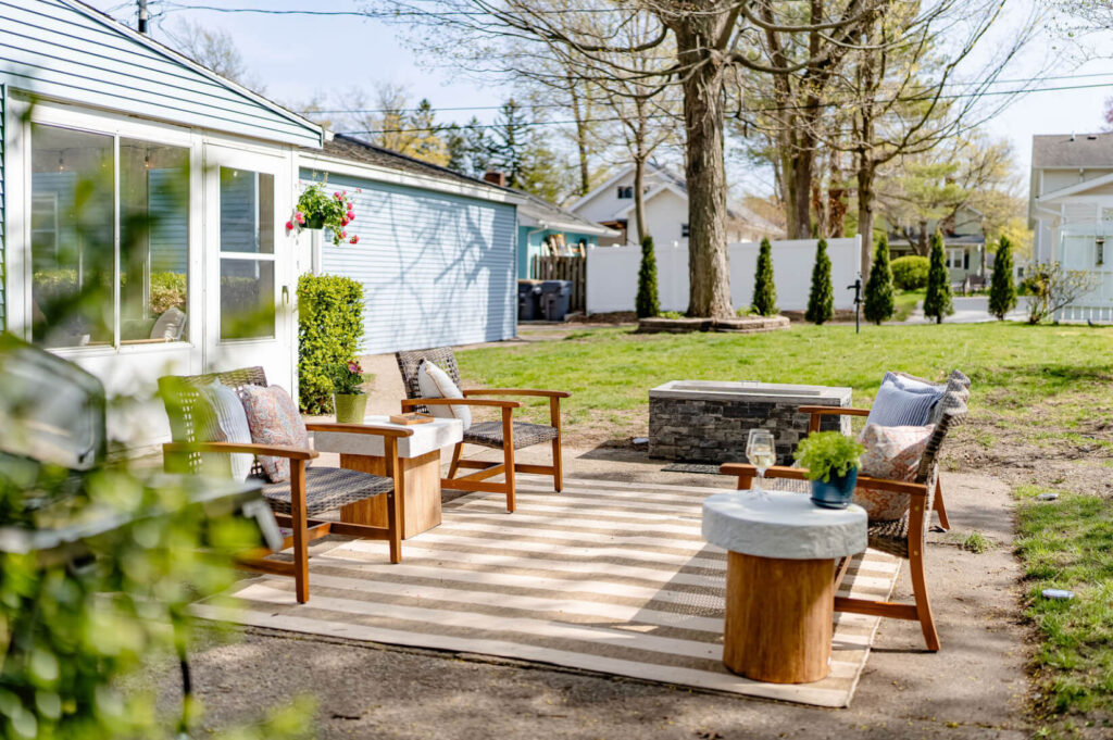 Outdoor rug, side tables. and furniture.