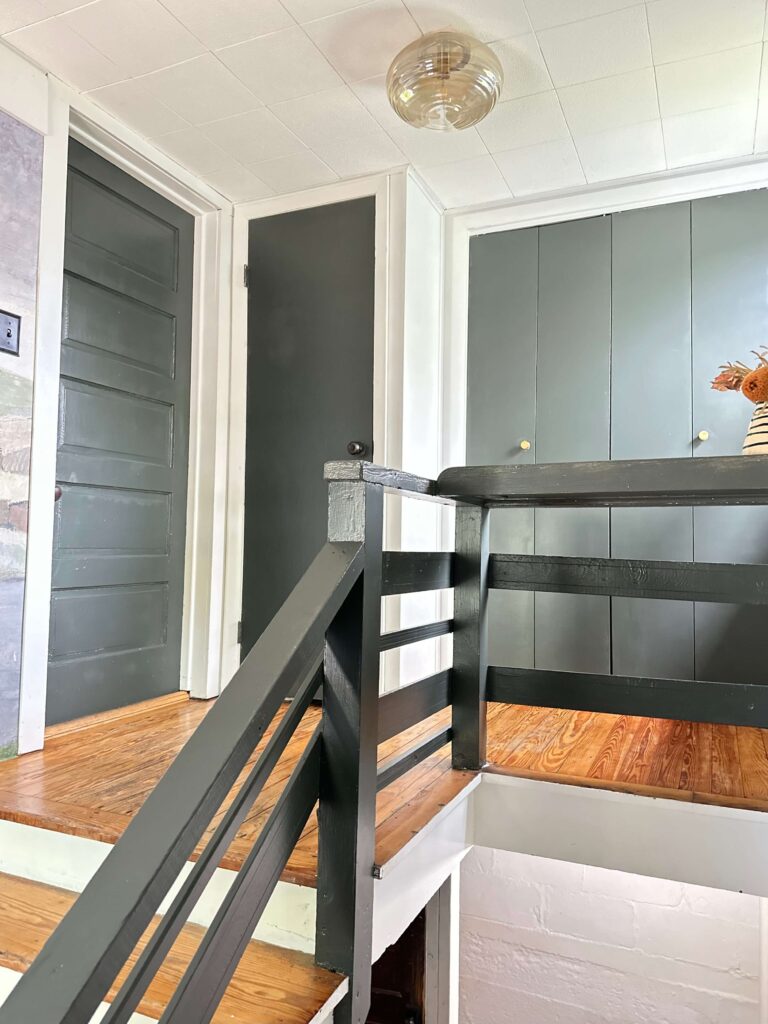 Painted Door with SW 7062 Rock Bottom in an Entryway/Mudroom Refresh.