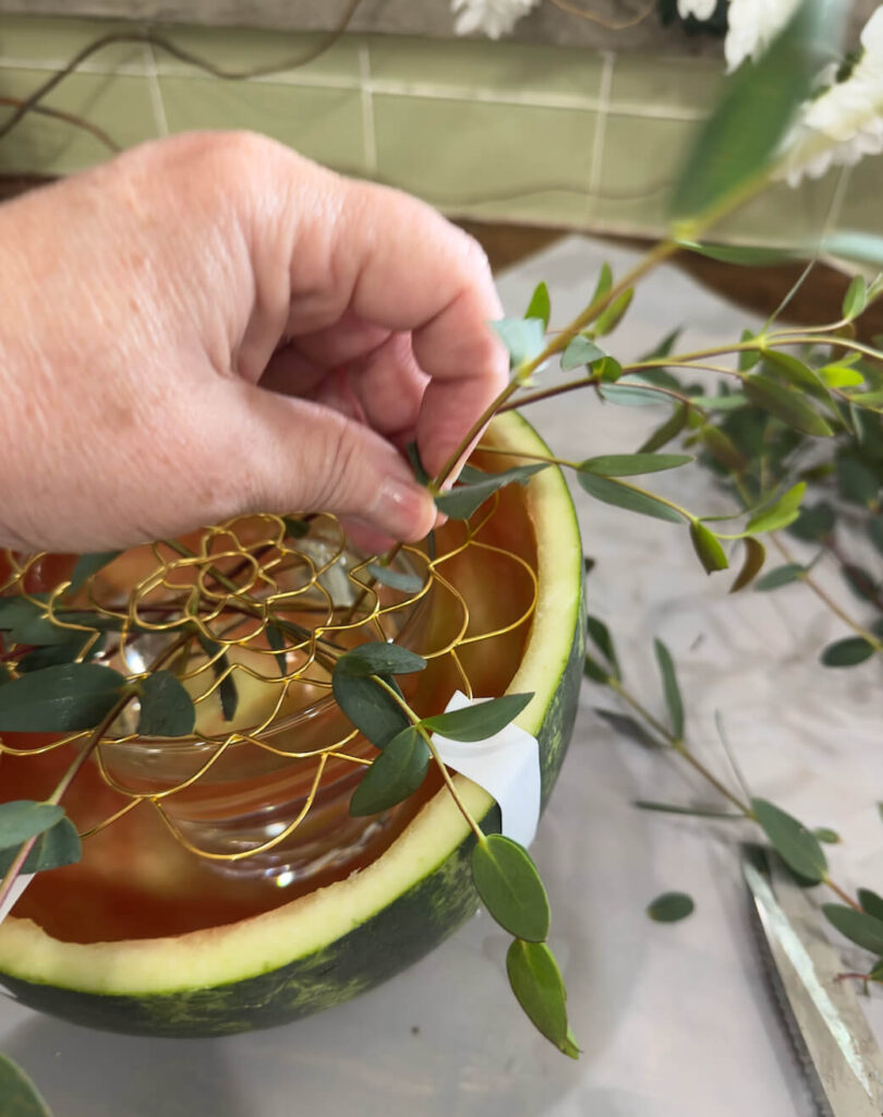 DIY Summer Watermelon Vase for a Floral Arrangement. Perfect for 4th of July or a summer picnic.