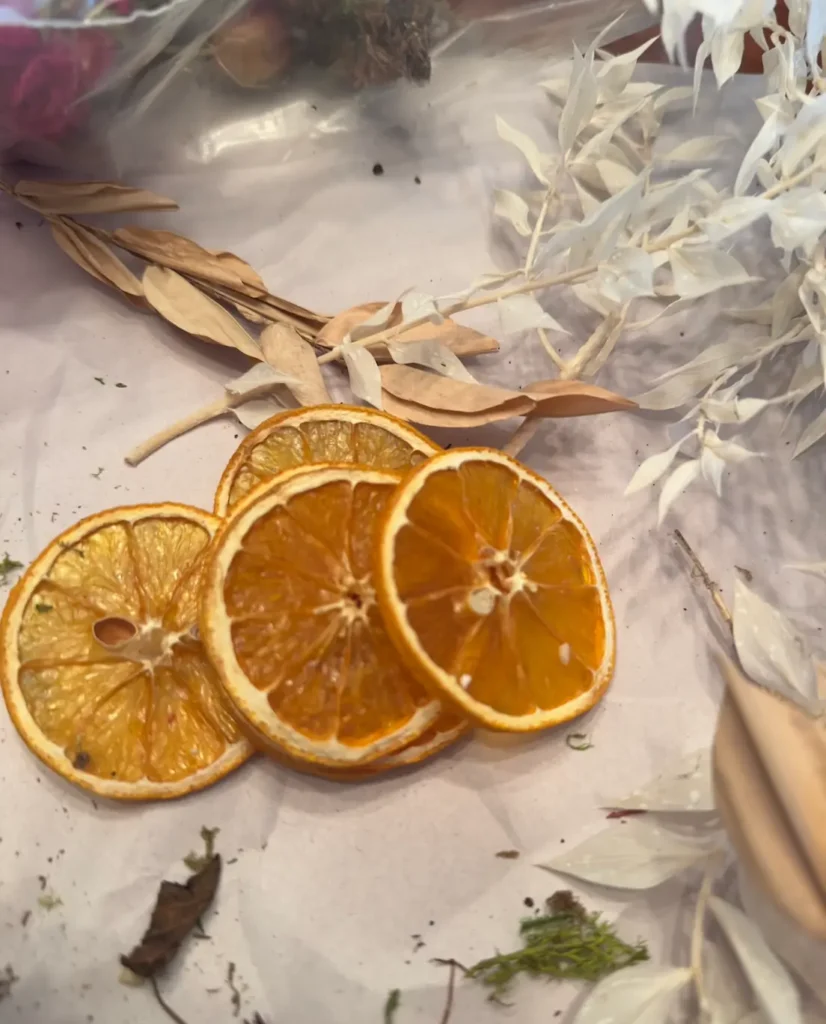 Dried Oranges for a DIY Christmas Wreath with Dried Fruit and Flowers.