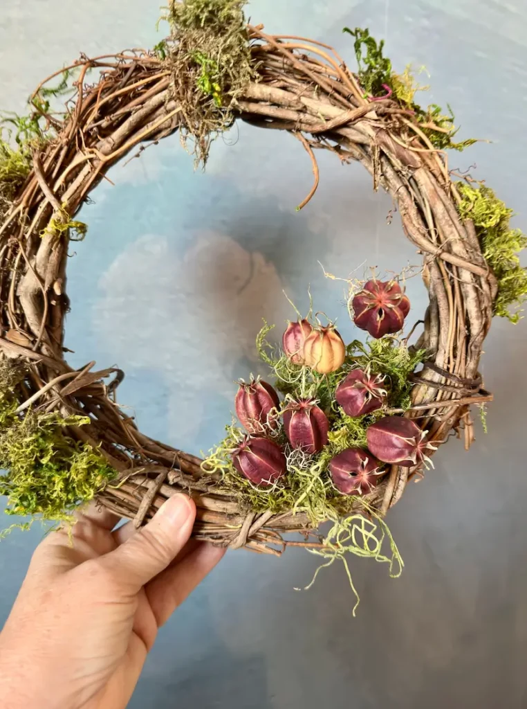 Grapevine wreath with Moss.
