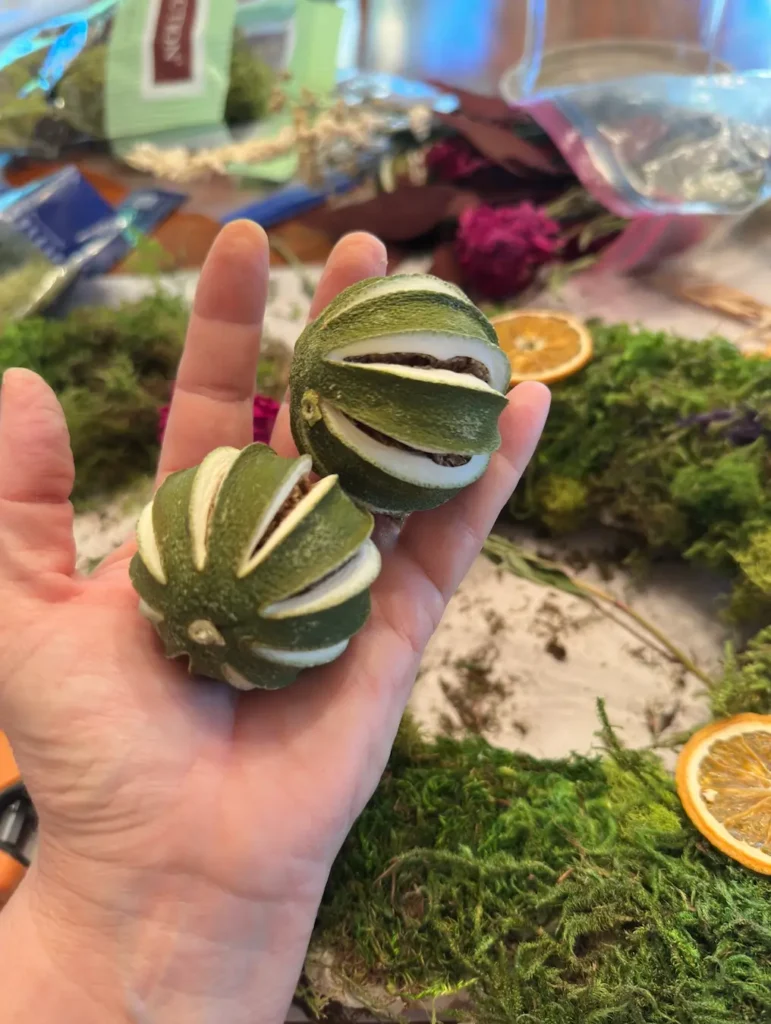 Whole dried limes for a Christmas Wreath