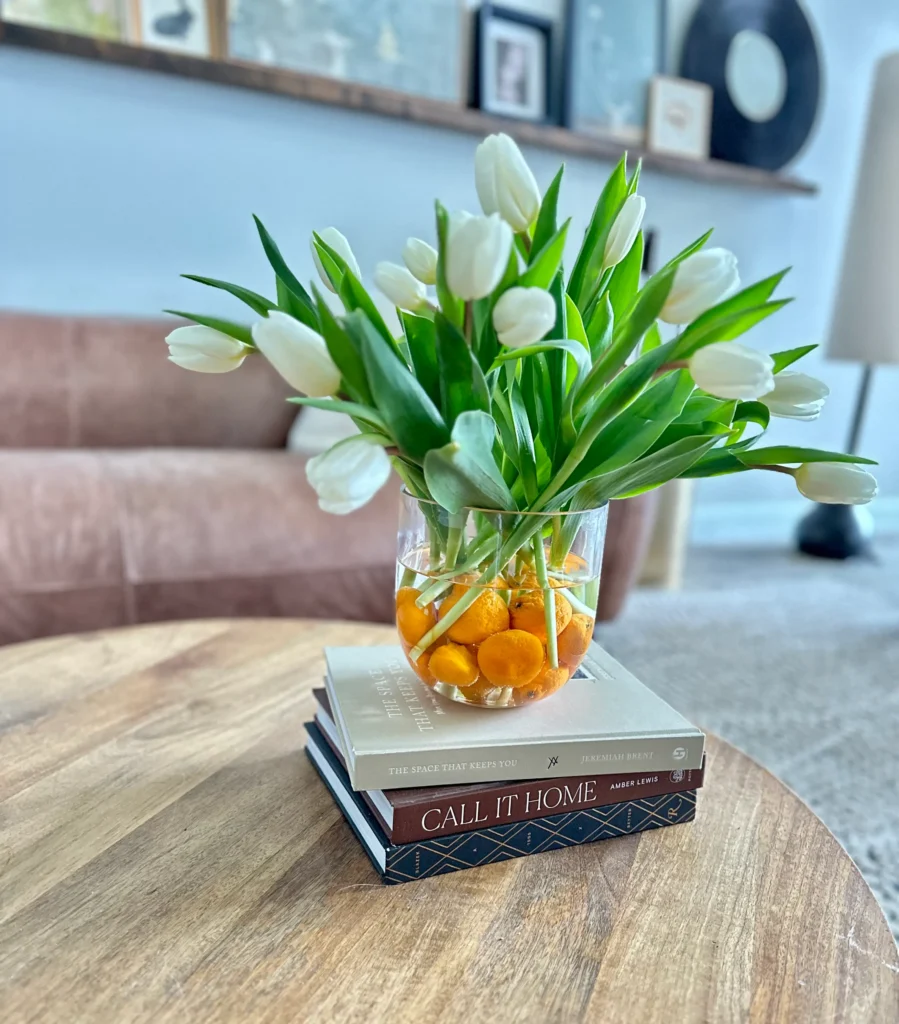 Vase of citrus and tulips
